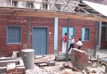 Life Process and Social Process Students of Kakhulong Junior High School looking into their classroom on Monday