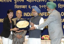 Smt. Mary Kom honoured by Prime Minister of India The Prime Minister, Dr. Manmohan Singh honours Smt. Mary Kom, the London Olympic Bronze Medal winner, at the All India Conference of Directors General/Inspectors General of Police -2012, in New Delhi on August 08, 2012. The Union Home Minister, Shri Sushil Kumar Shinde and the Director, Intelligence Bureau, Shri Nehchal Sandhu are also seen.