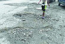 Major roads in Imphal dotted with potholes